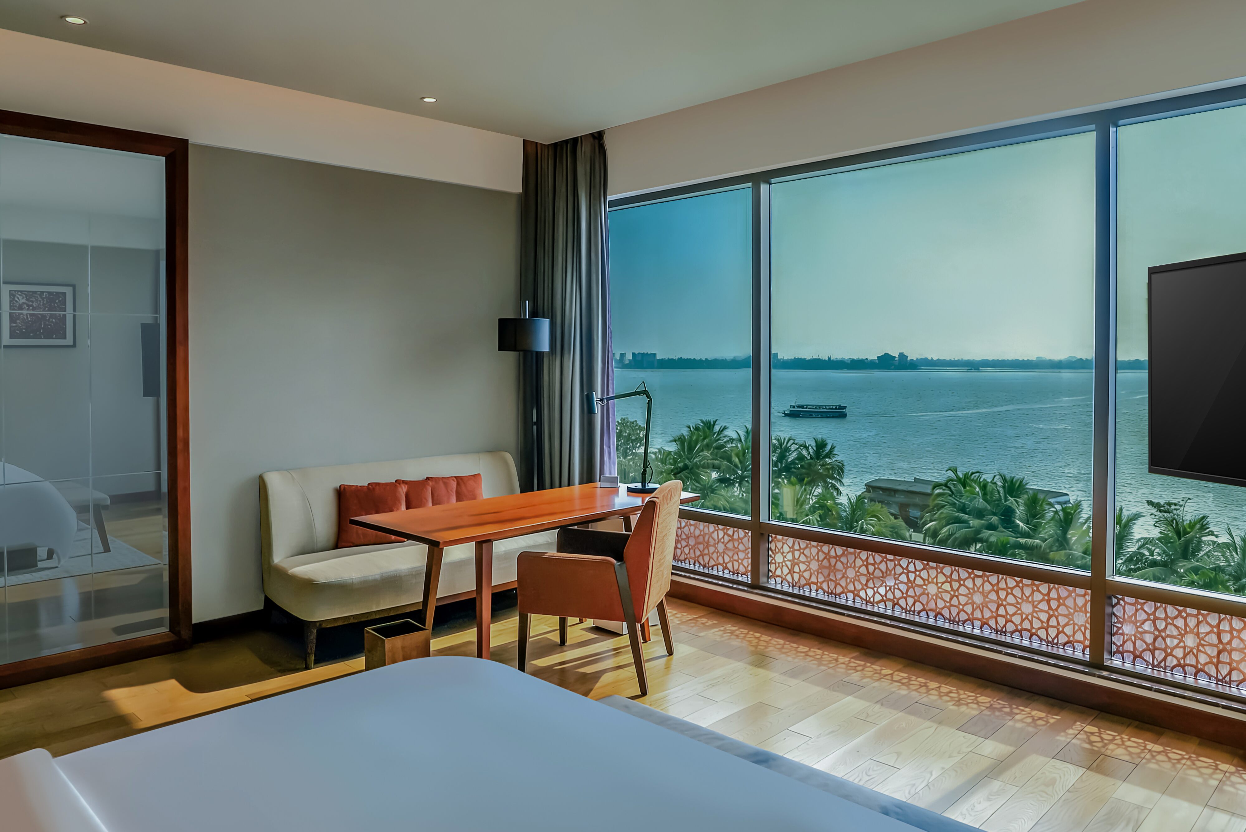 Luxury Hotel Room View Premium hotel room interior with panoramic ocean view.