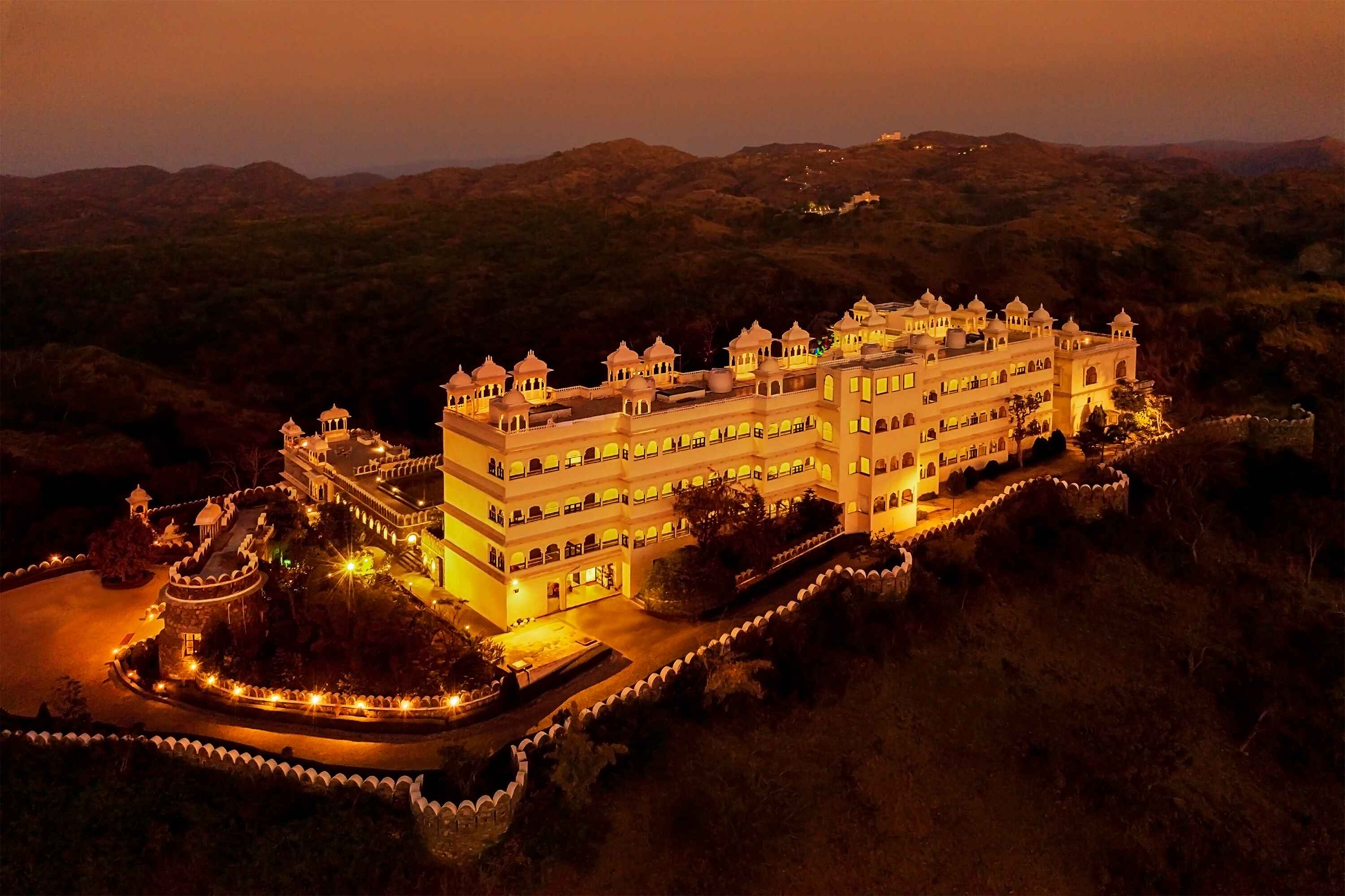 Luxury Palace Hotel Aerial Aerial photograph of a grand luxury palace hotel surrounded by nature.