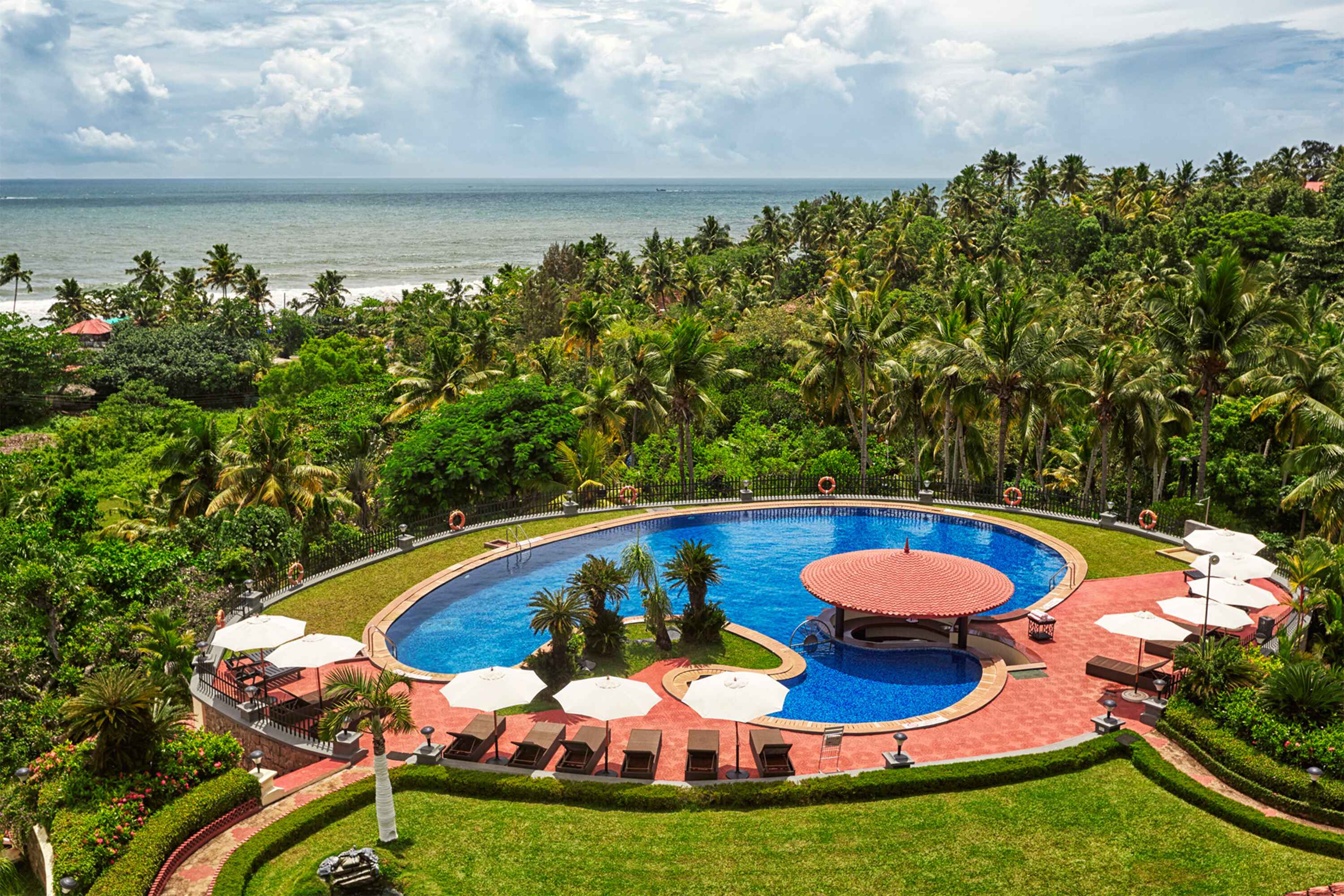 Luxury Resort Aerial View Drone view of a luxury beachfront resort highlighting architecture and landscape.